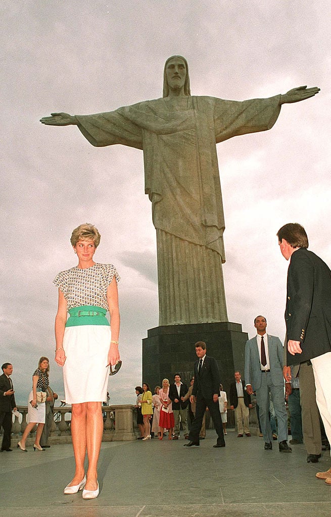 Princess Diana posing in front of Chris the Redeemer