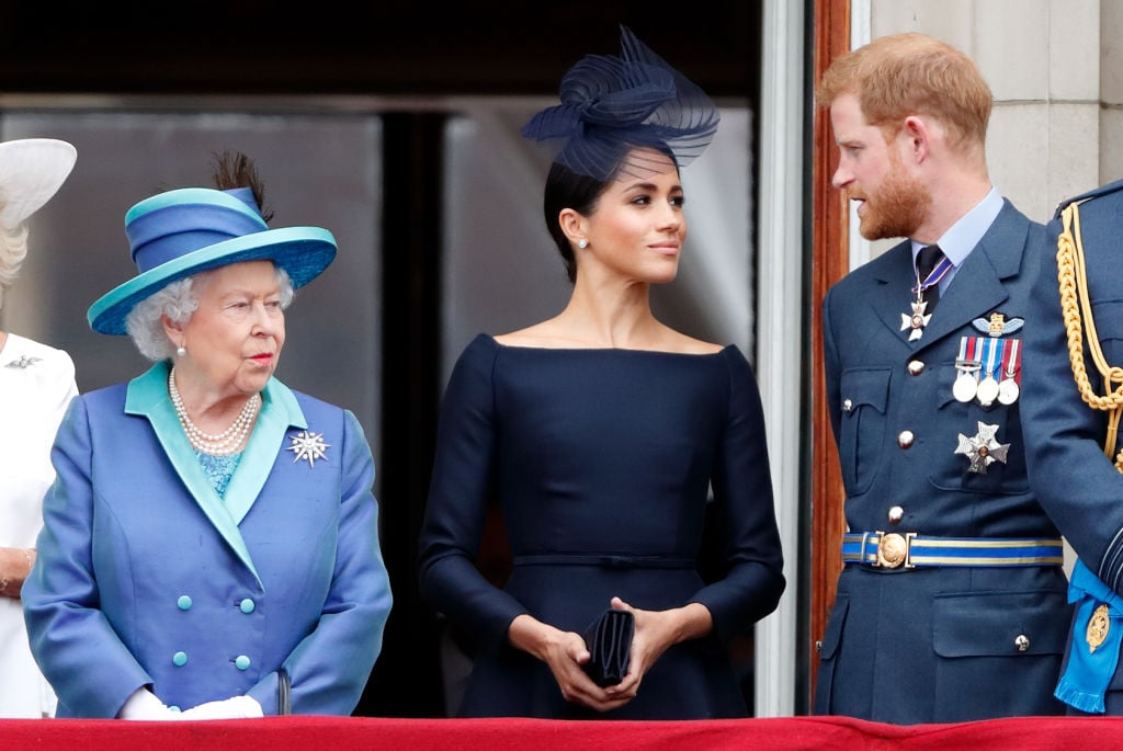 Queen Elizabeth II, Meghan, Duchess of Sussex and Prince Harry 