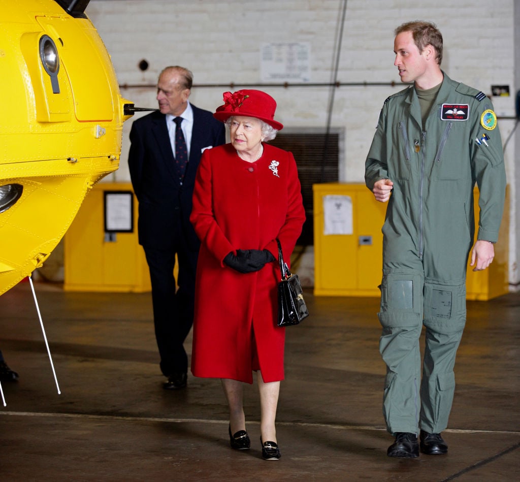 Queen Elizabeth II, Prince Philip, and Prince William in 2011