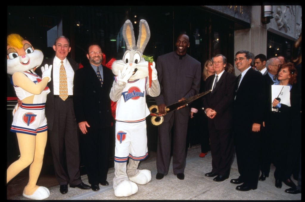 Space Jam | Bugs and Lola Bunny, Michael Jordan, and Warner Bros. executives stand in front of the Warner Bros. Studio store October 23, 1996 in New York City