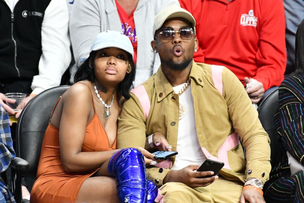 Summer Walker and London On Da Track at a basketball game in March 2020 in Los Angeles, California