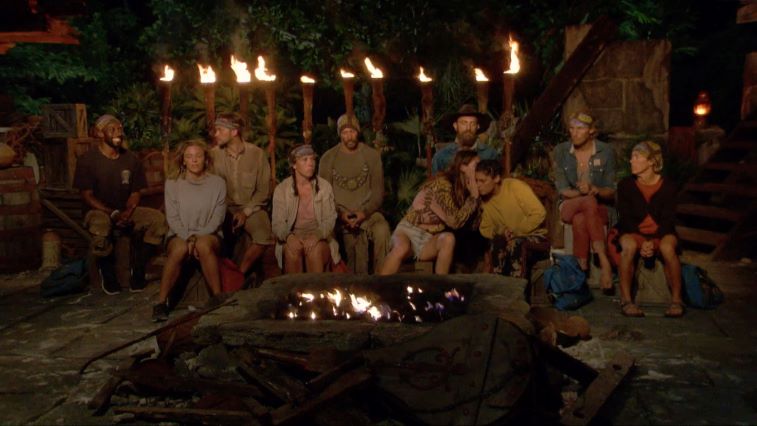 Castaways whispering at tribal council
