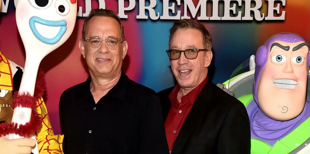 Tom Hanks and Tim Allen on the red carpet at a movie premiere in June 2019