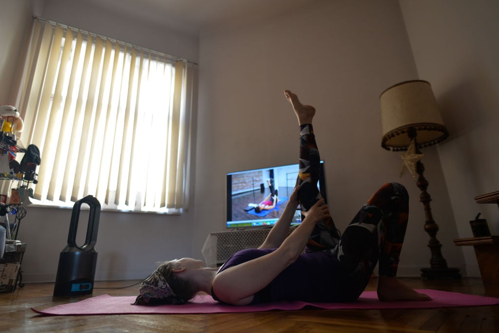 Woman exercising at home in Krakow