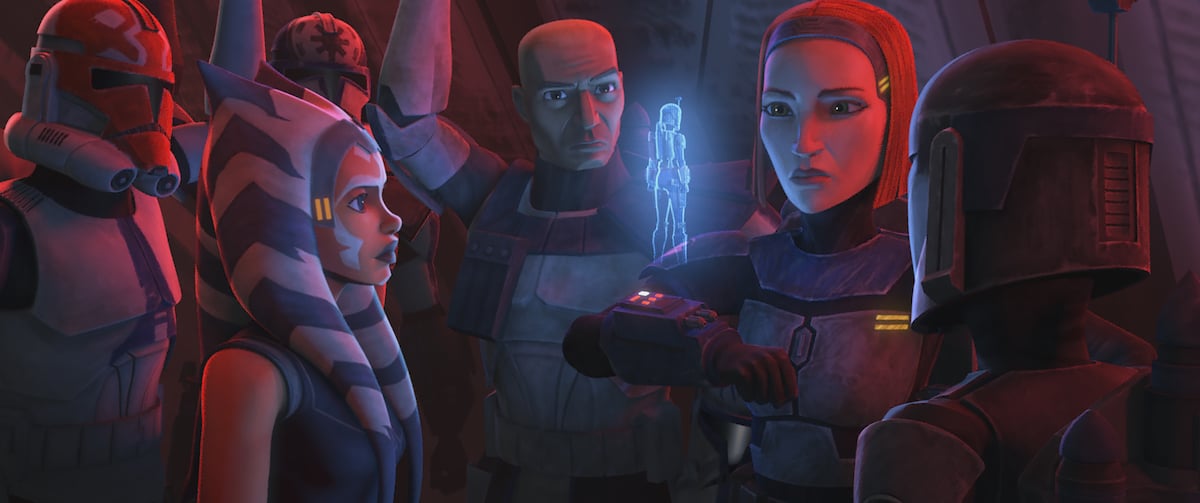 Bo-Katan speaks with Ursa Wren as Ahsoka, Rex, and the 332nd Company looks on, 'Star Wars: The Clone Wars.'
