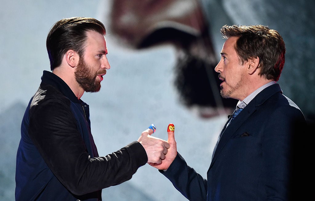 Chris Evans and Robert Downey Jr. onstage during the 2016 Kids' Choice Awards
