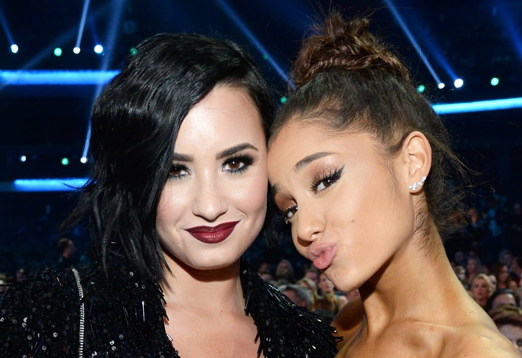 Demi Lovato and Ariana Grande attend the 2015 American Music Awards on November 22, 2015