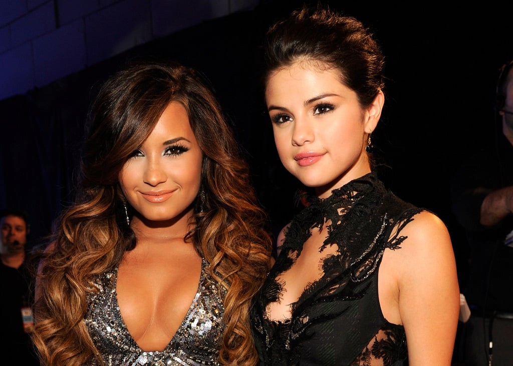 Demi Lovato and Selena Gomez arrive at the 28th Annual MTV Video Music Awards on August 28, 2011 in Los Angeles, California