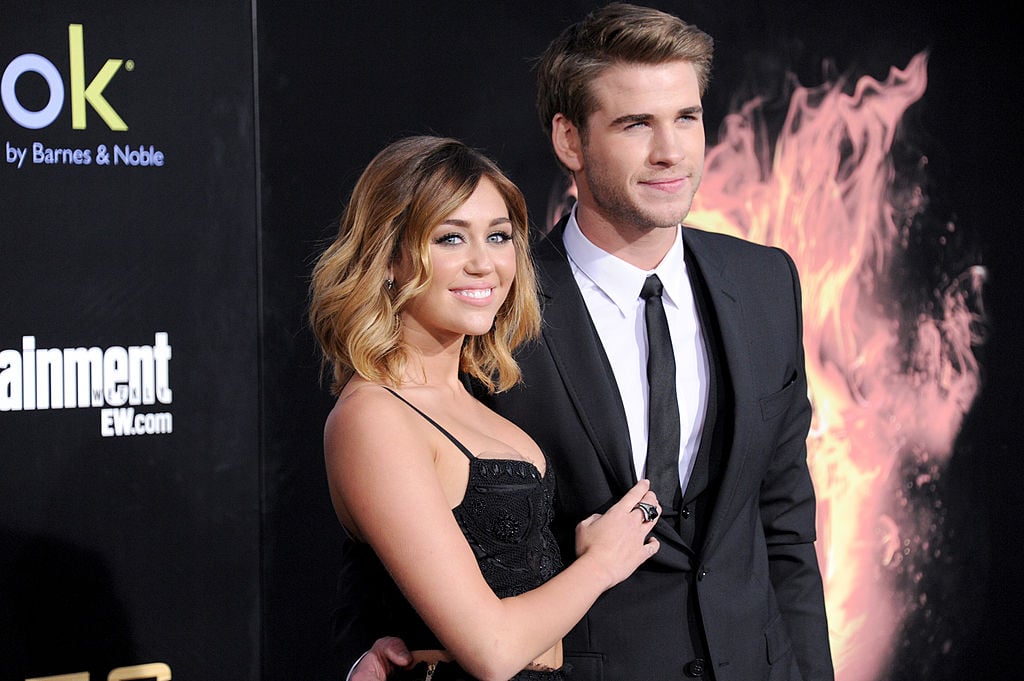Miley Cyrus and Liam Hemsworth attend 'The Hunger Games' Los Angeles Premiere on March 12, 2012