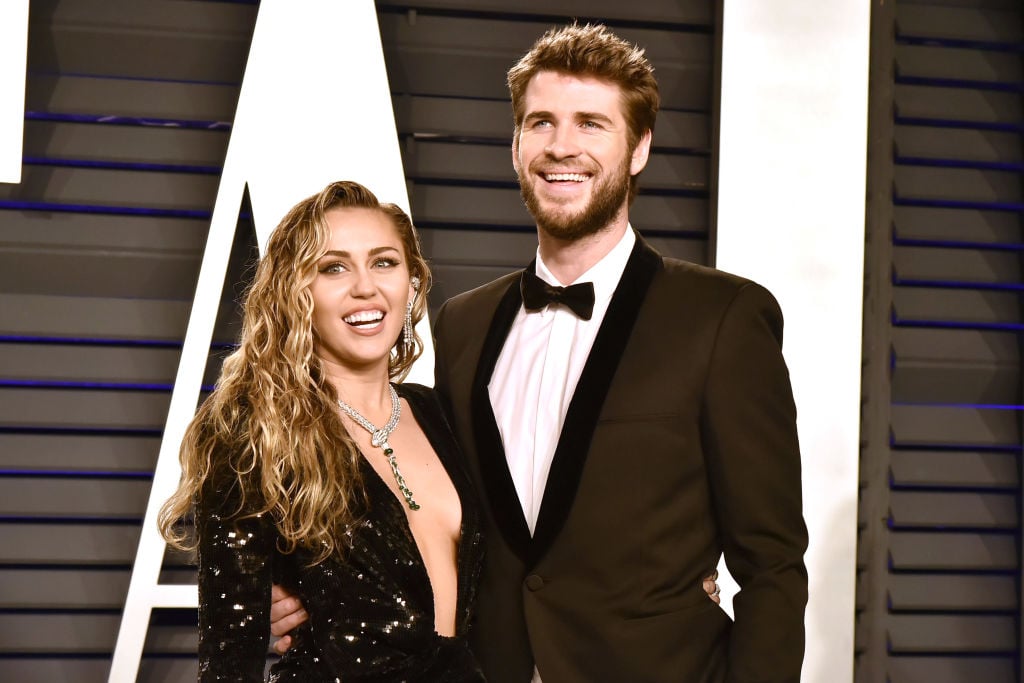 Liam Hemsworth and Miley Cyrus attend the Vanity Fair Oscar Party on February 24, 2019 