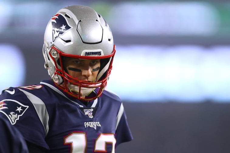 Tom Brady playing football