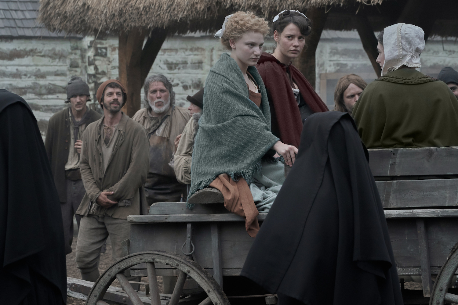 Melissande (Tallulah Haddon), Delphine (Lily Sullivan), and the other Filles Du Roi arrive in Wobik.