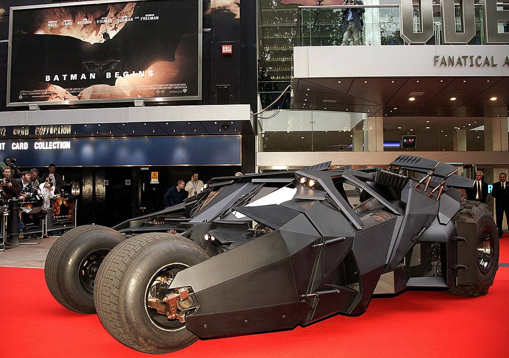 The Batmobile sitting on the red carpet