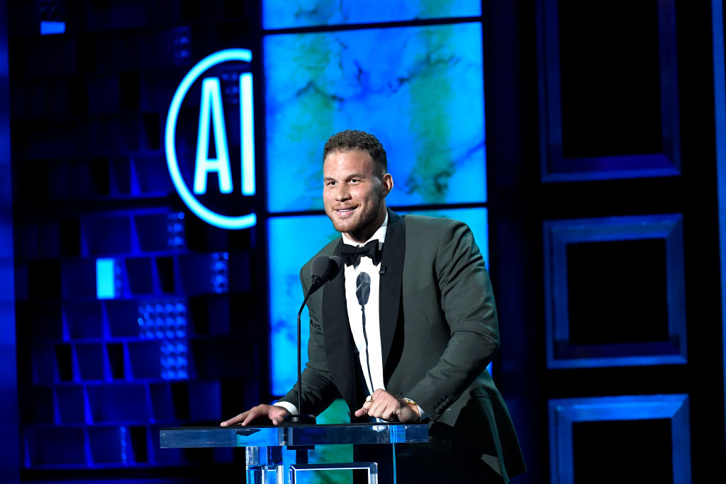 Blake Griffin smiling at a podium