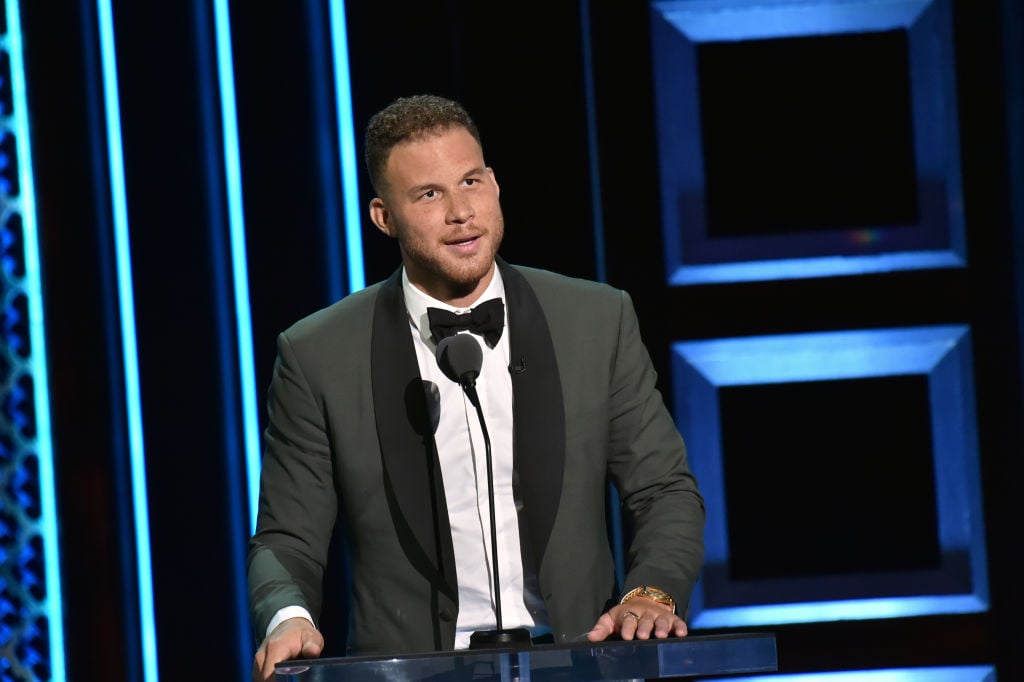 Blake Griffin smiling while speaking at a podium