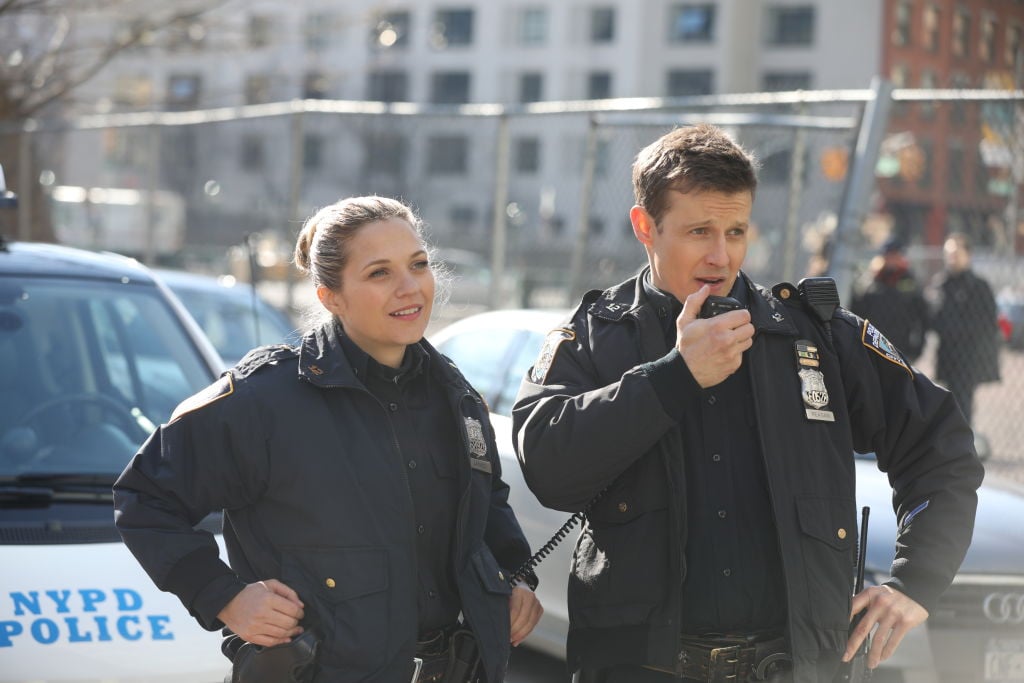 Vanessa Ray as Eddie Janko and Will Estes as Jamie Reagan