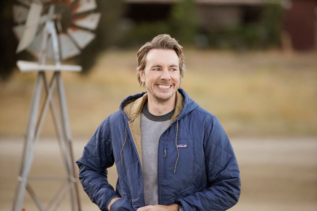 Dax Shepard simling on the set of 'Bless This Mess'