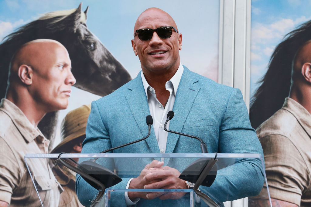 Dwayne Johnson at the Hand And Footprint Ceremony honoring Kevin Hart