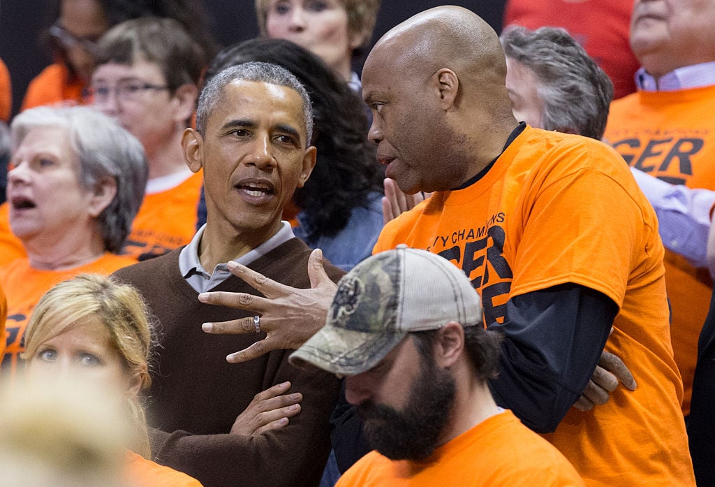 Former U.S. president Barack Obama and his brother-in-law Craig Robinson