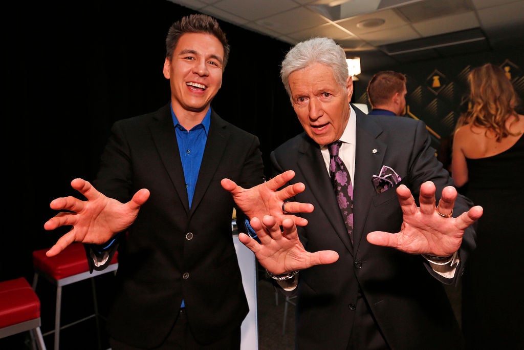 "Jeopardy!" host Alex Trebek poses with 'Jeopardy!' champion James Holzhauer backstage at the 2019 NHL Awards.