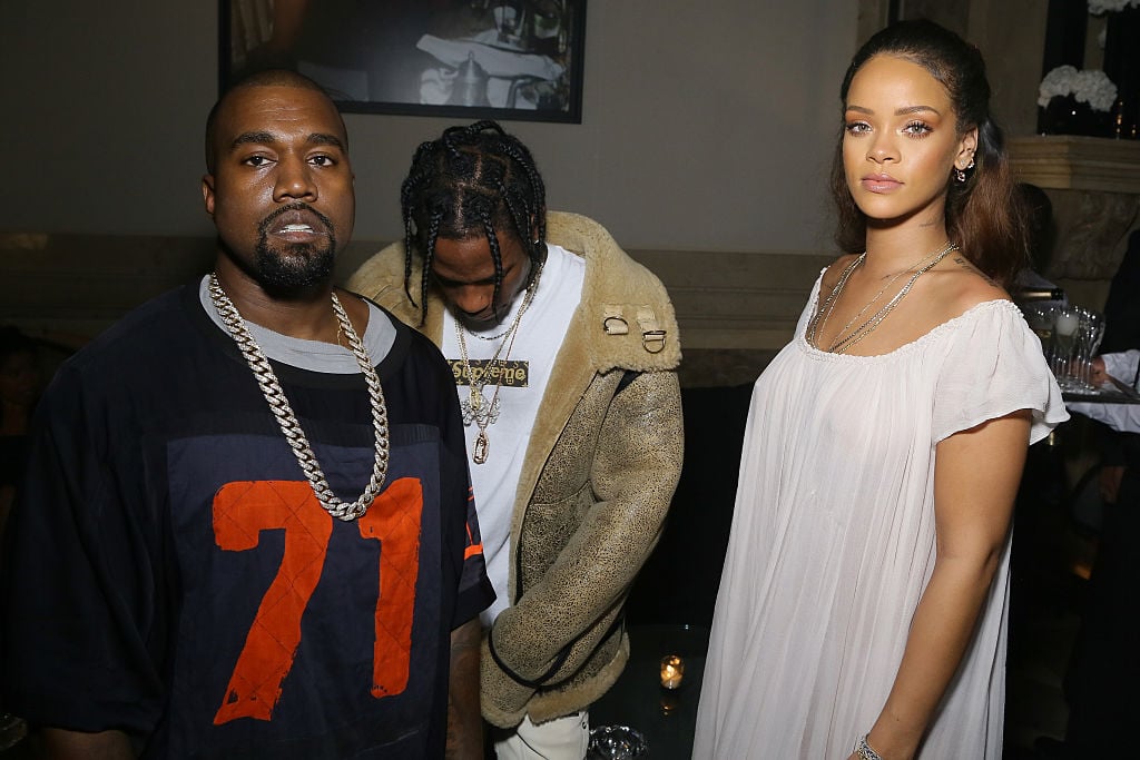 Kanye West, Travis Scott and Rihanna at a party in October 2015