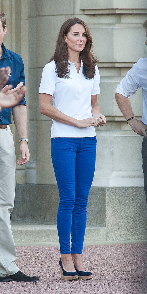 Kate Middleton waits for the Olympic Torch