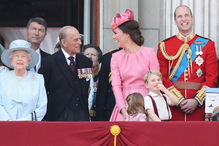 Kate Middleton laughs with Prince Philip as Queen Elizabeth and Prince William look on