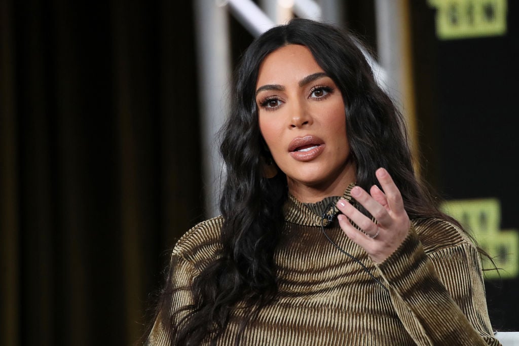 Kim Kardashian West Slammed by Fans for Describing a Solid Black Face Mask  on an African American Model as 'Nude