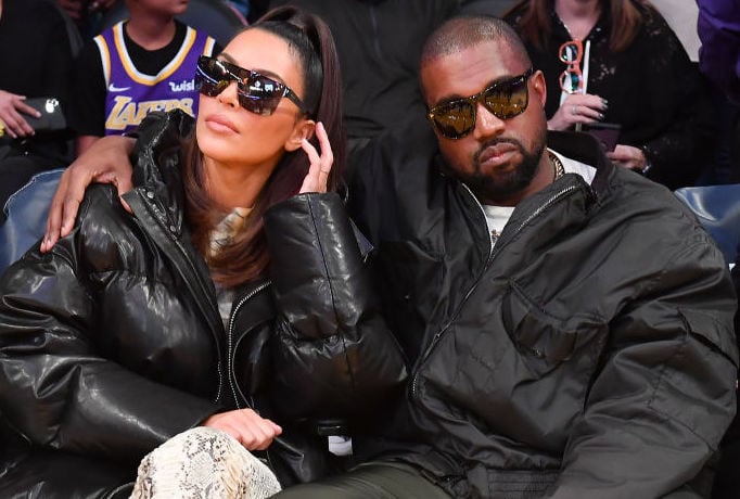 Kim Kardashian West and Kanye West at a basketball game in January 2020