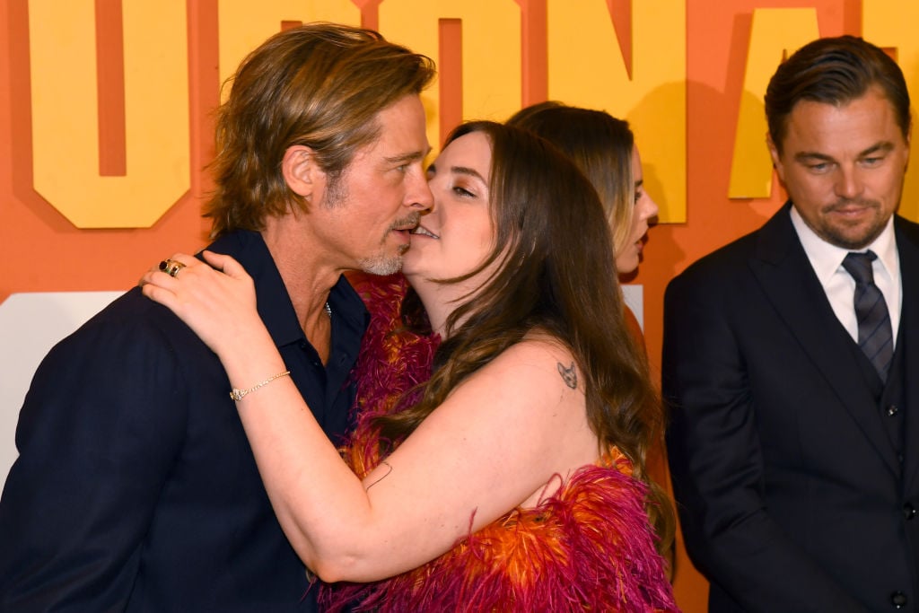 Lena Dunham and Brad Pitt kissing on the red carpet