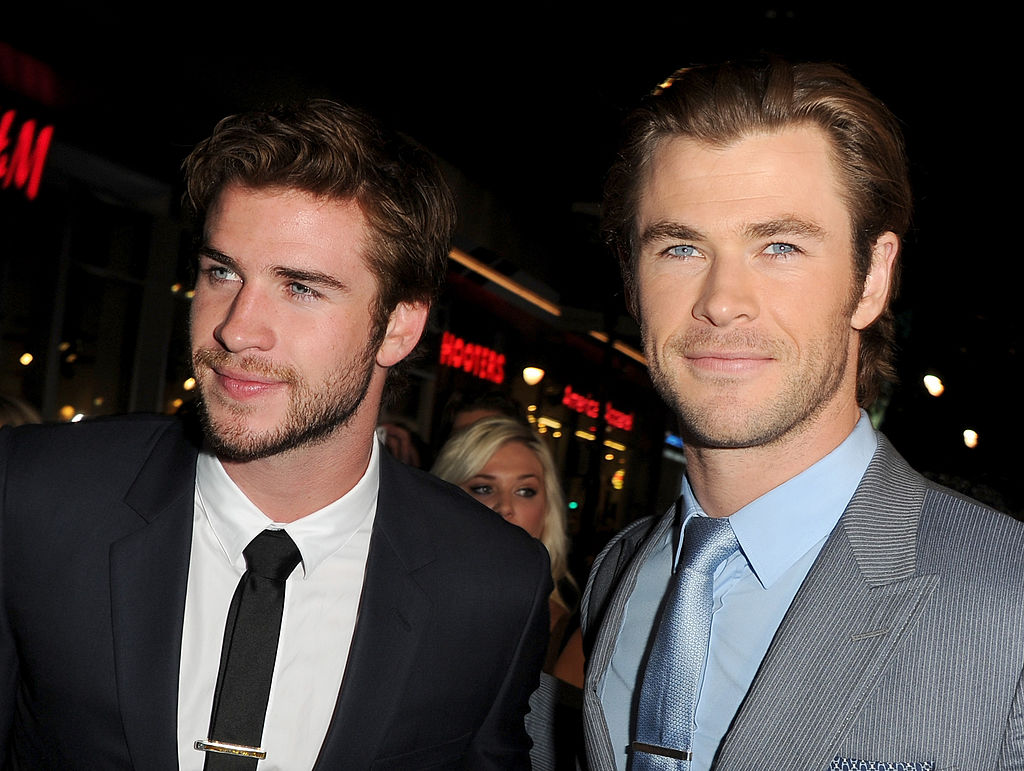 Liam Hemsworth (L) and Chris Hemsworth arrive at the premiere of Marvel's 'Thor: The Dark World' 
