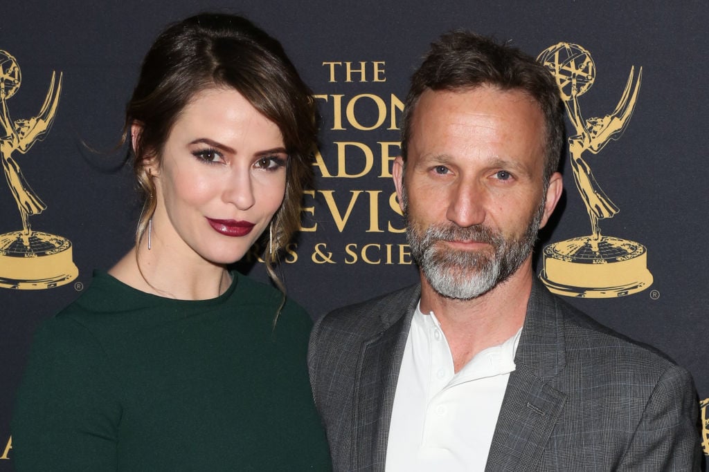 Linsey Godfrey and Breckin Meyer