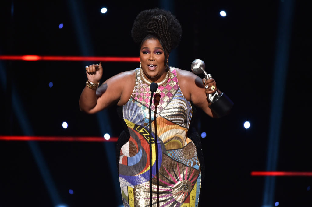 Lizzo accepts Entertainer of the Year award onstage during the 51st NAACP Image Awards