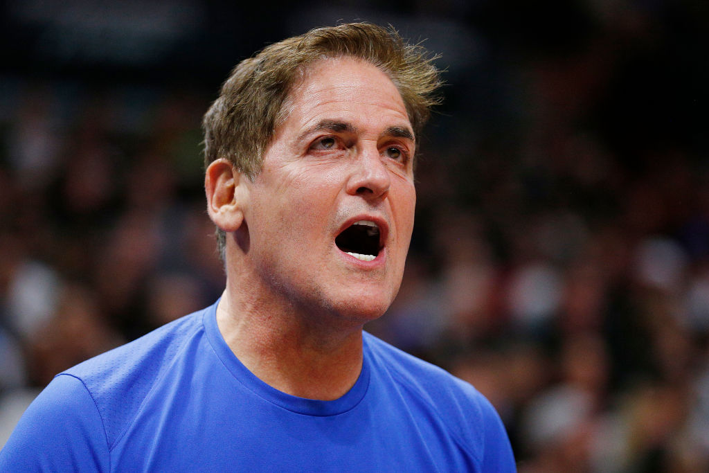 Owner Mark Cuban of the Dallas Mavericks reacts against the Miami Heat d