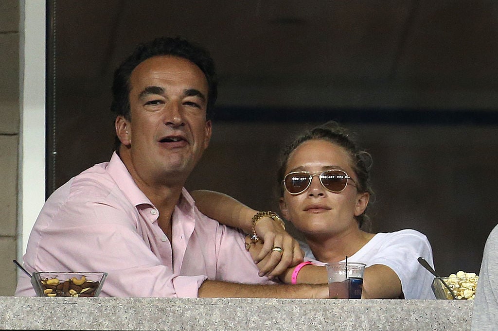 Mary-Kate Olsen and Olivier Sarkozy attend Day 8 of the 2014 US Open at USTA Billie Jean King National Tennis Center