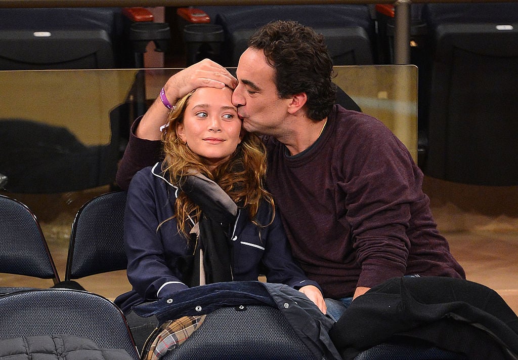 Mary-Kate Olsen and Olivier Sarkozy attend the Dallas Mavericks vs New York Knicks game at Madison Square Garden on November 9, 2012