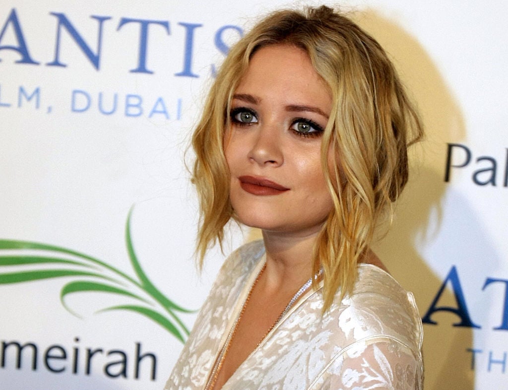 Mary-Kate Olsen poses for a picture at the official grand opening party for the Atlantis Hotel on the Palm Jumeirah in Dubai