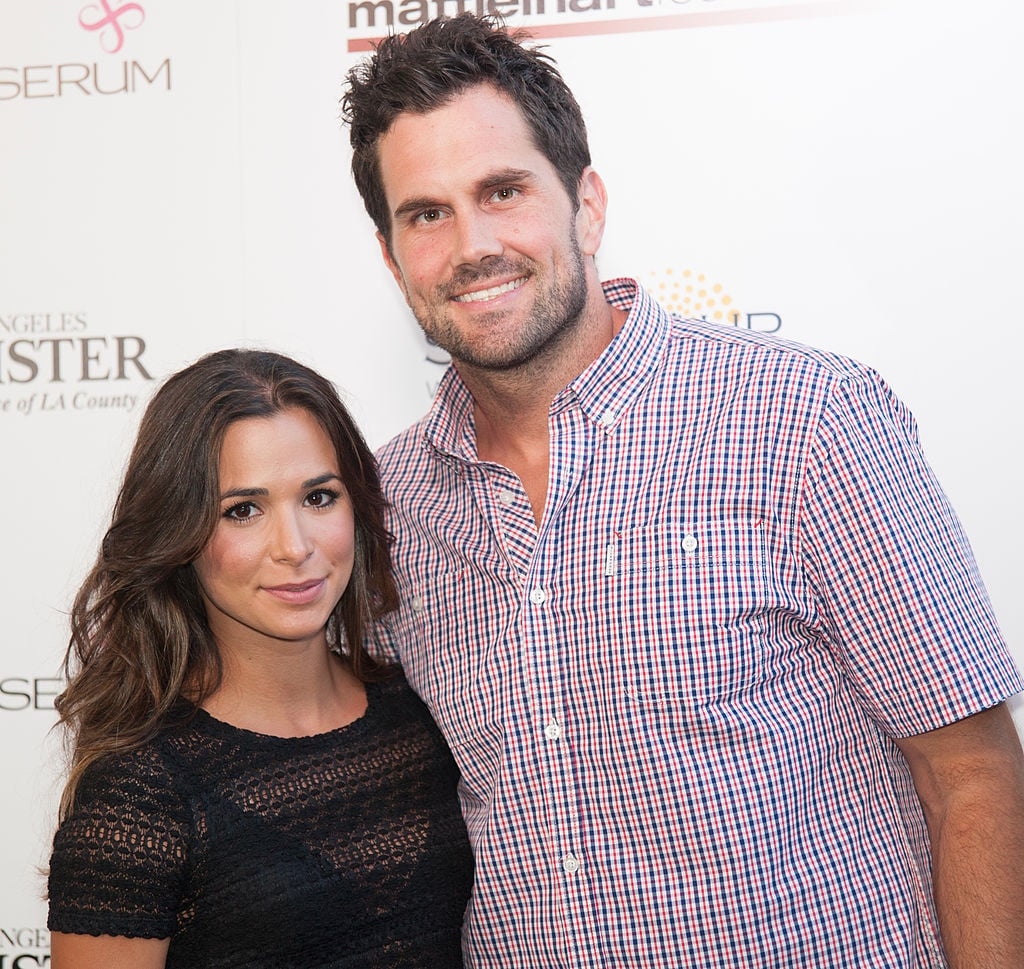 Matt Leinart and his wife Josie Loren posing at a charity event