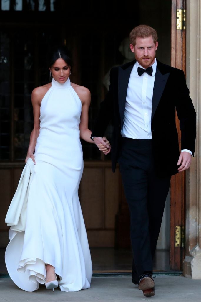 Meghan Markle and Prince Harry leave Windsor Castle for their royal wedding reception