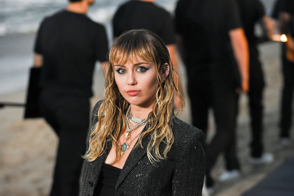 Miley Cyrus at a fashion show for Saint Laurent