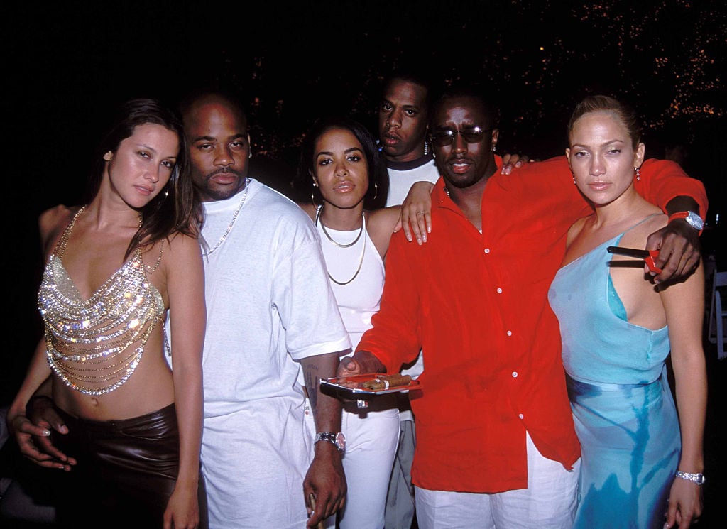 Natane Adcock, Damon Dash, Aaliyah, JAY-Z, Diddy, and Jennifer Lopez at a party in July 2000