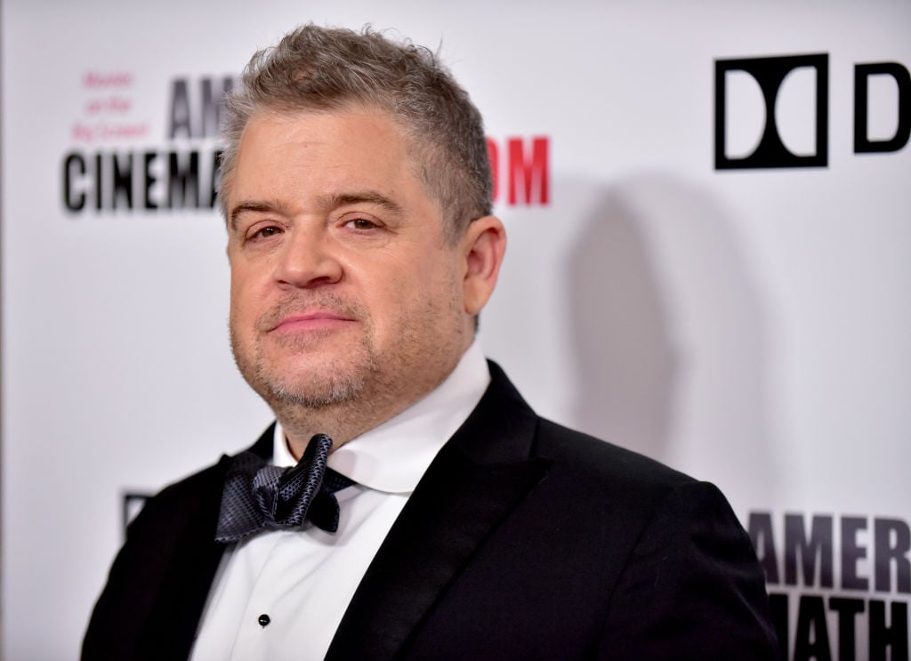 Patton Oswalt smiling slightly at the camera