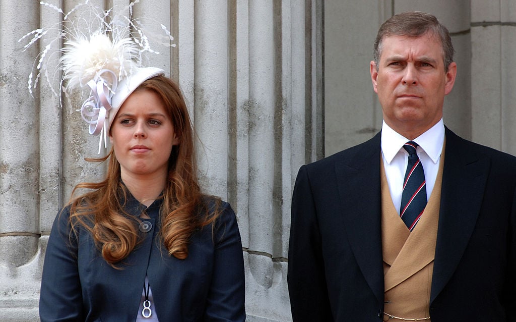 Prince Andrew, Duke of York stands with his daughter, Princess Beatrice on the balcony of Buckingham Palace 