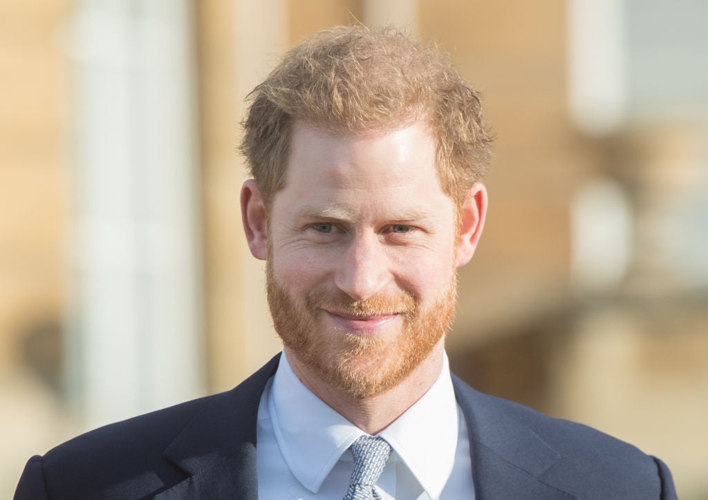 Prince Harry, Duke of Sussex, smiling looking off camera