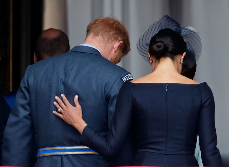 Meghan Markle often puts her hand on Prince Harry's back for reassurance.