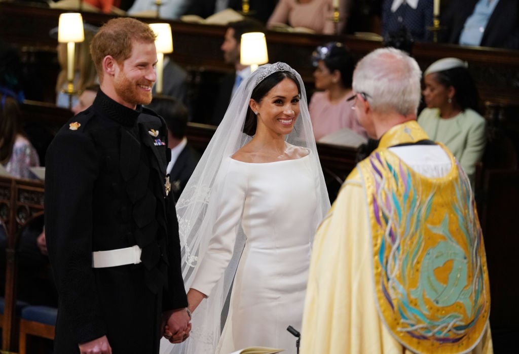 Prince Harry and Meghan Markle smile during their royal wedding