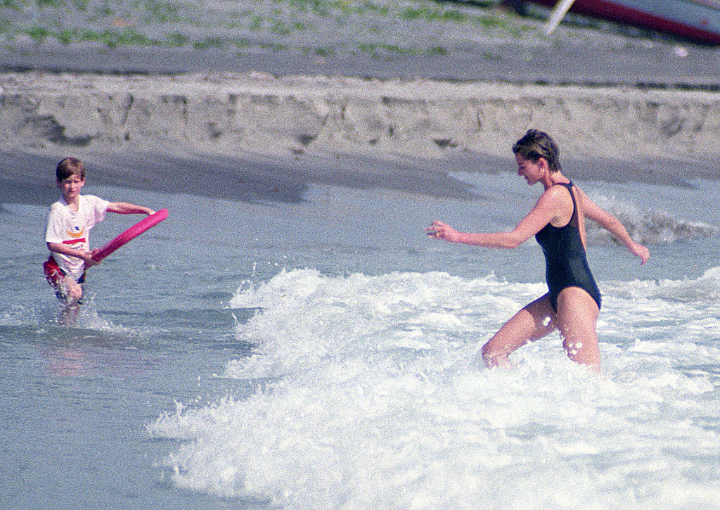 Prince Harry and Princess Diana on the beach in the Caribbean