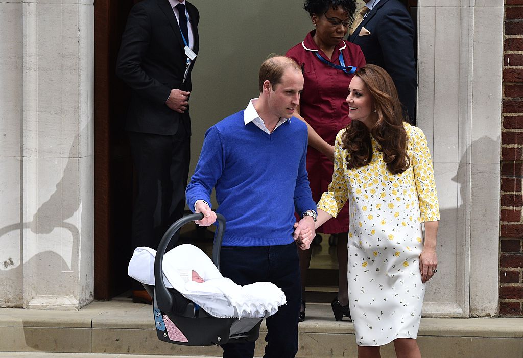 Prince William and Kate Middleton exit the Lindo Wing with a newborn Princess Charlotte, 2015