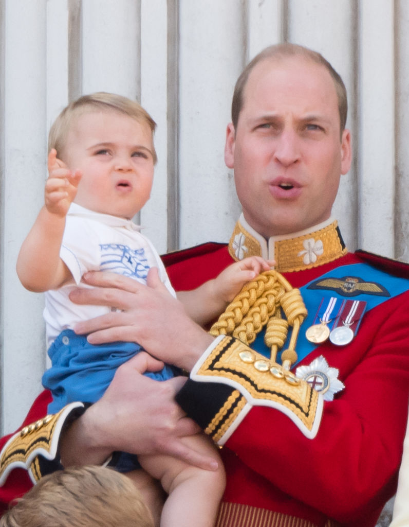 Prince William holds Prince Louis at 2019 Trooping the Colour