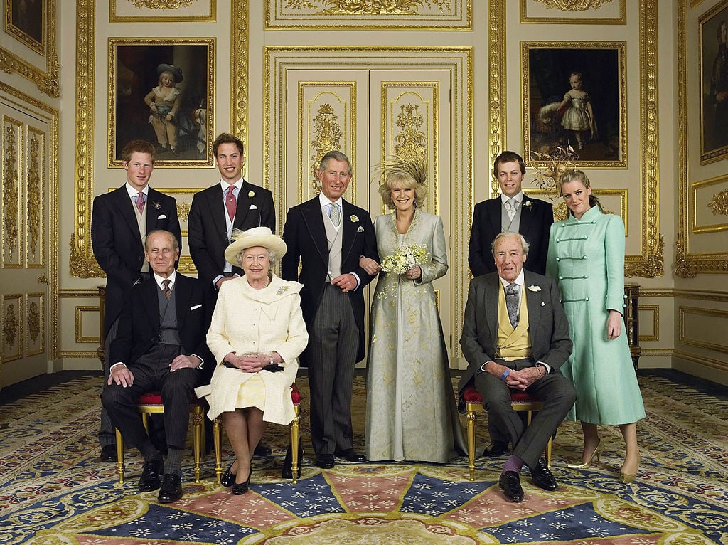 Clarence House official handout photo of the Prince of Wales and his new bride Camilla, Duchess of Cornwall, with their families (L-R back row) Prince Harry, Prince William, Tom and Laura Parker Bowles (L-R front row) Duke of Edinburgh, Britain's Queen Elizabeth II and Camilla's father Major Bruce Shand, in the White Drawing Room at Windsor Castle after their wedding ceremony, April 9, 2005 in Windsor, England
